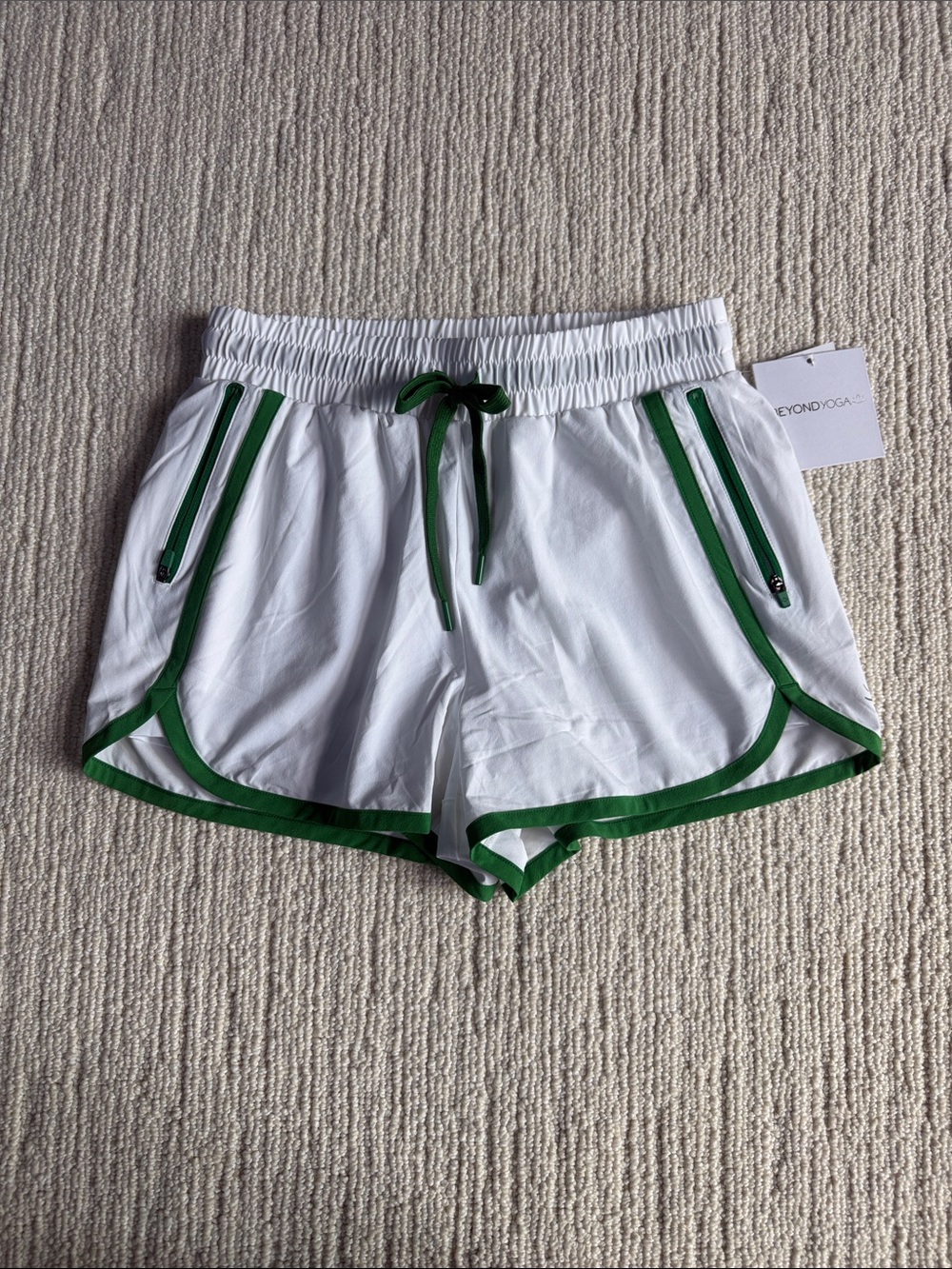Beyond Yoga White Athletic Shorts with Green Trim